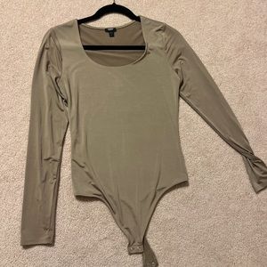 Body contour dark nude long sleeve body suit